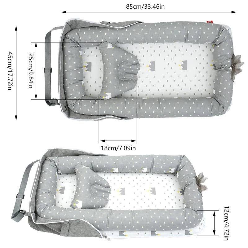 Portable und faltbare Babybett mit Kissen