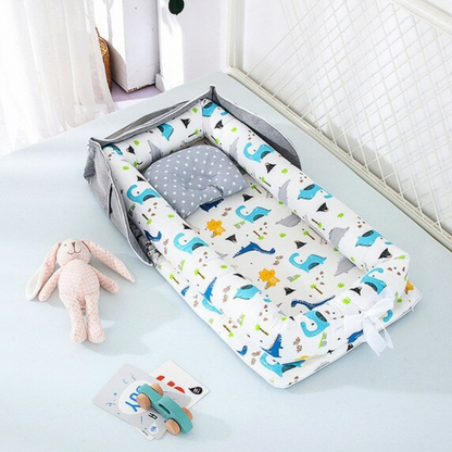 Portable und faltbare Babybett mit Kissen