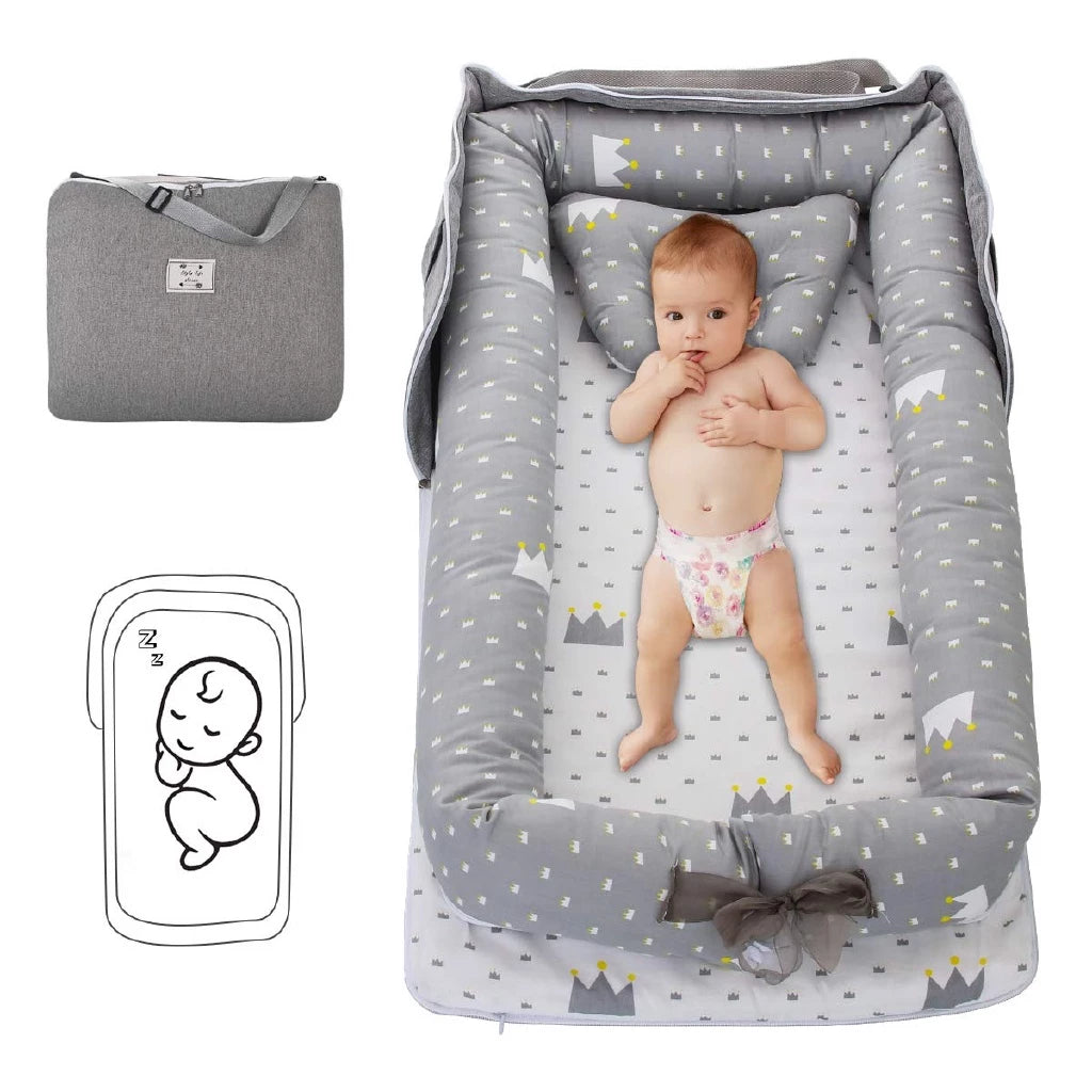 Portable und faltbare Babybett mit Kissen