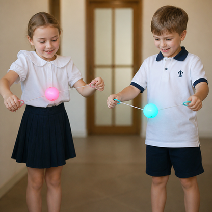 Leuchtender Pfeif-Kreiselball mit Zugschnur für Kinder
