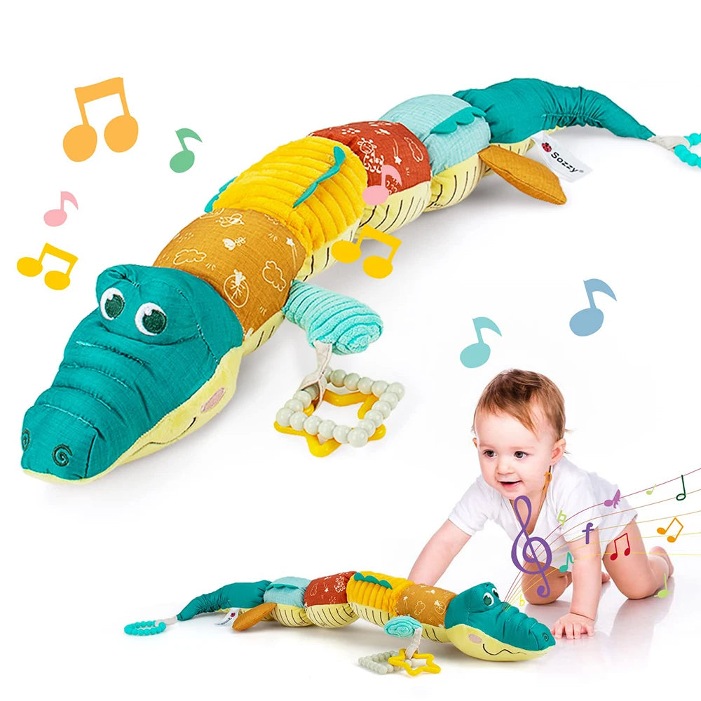 Sensorisches Plüsch Rassel und Musik Krokodil